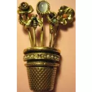 Thimble Full O' Talent Enterprises logo