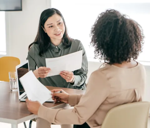Woman interviewing another Woman